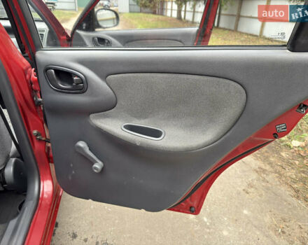 Черный Дэу Ланос, объемом двигателя 1.6 л и пробегом 156 тыс. км за 2400 $, фото 12 на Automoto.ua