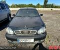 Черный Дэу Ланос, объемом двигателя 1.5 л и пробегом 516 тыс. км за 1770 $, фото 1 на Automoto.ua