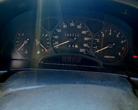 Черный Дэу Ланос, объемом двигателя 1.5 л и пробегом 365 тыс. км за 2000 $, фото 6 на Automoto.ua