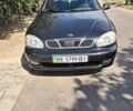 Черный Дэу Ланос, объемом двигателя 1.5 л и пробегом 120 тыс. км за 2600 $, фото 1 на Automoto.ua
