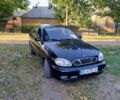 Чорний Деу Ланос, об'ємом двигуна 1.6 л та пробігом 215 тис. км за 2552 $, фото 1 на Automoto.ua