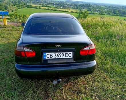 Черный Дэу Ланос, объемом двигателя 1.5 л и пробегом 230 тыс. км за 1500 $, фото 3 на Automoto.ua