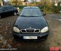 Черный Дэу Ланос, объемом двигателя 1.4 л и пробегом 220 тыс. км за 1800 $, фото 1 на Automoto.ua
