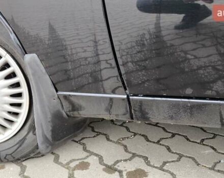 Черный Дэу Ланос, объемом двигателя 1.39 л и пробегом 213 тыс. км за 2300 $, фото 9 на Automoto.ua