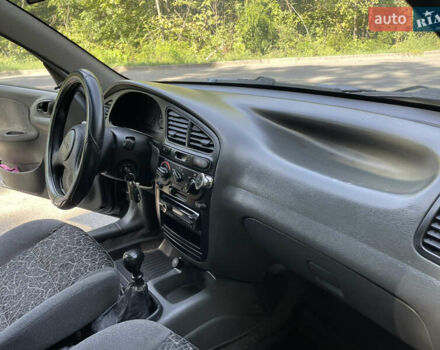 Чорний Деу Ланос, об'ємом двигуна 1.5 л та пробігом 182 тис. км за 2850 $, фото 38 на Automoto.ua