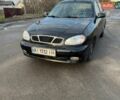 Чорний Деу Ланос, об'ємом двигуна 1.5 л та пробігом 220 тис. км за 1550 $, фото 1 на Automoto.ua