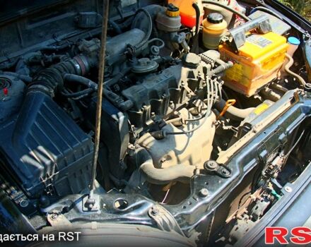 Черный Дэу Ланос, объемом двигателя 1.6 л и пробегом 104 тыс. км за 3000 $, фото 2 на Automoto.ua