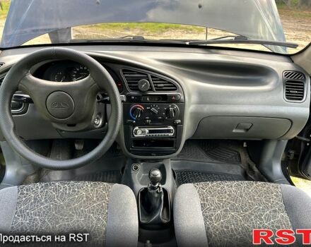 Деу Ланос 2008 у Вышгороде на Automoto.ua Чорний Деу Ланос, об'ємом двигуна 1.5 л та пробігом 210 тис. км за 1900 $, фото 11 на Automoto.ua