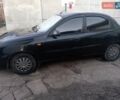 Чорний Деу Ланос, об'ємом двигуна 1.5 л та пробігом 184 тис. км за 3000 $, фото 1 на Automoto.ua