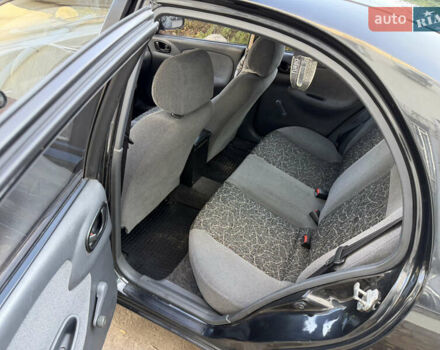 Черный Дэу Ланос, объемом двигателя 1.5 л и пробегом 100 тыс. км за 2900 $, фото 23 на Automoto.ua