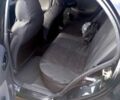 Черный Дэу Ланос, объемом двигателя 1.4 л и пробегом 230 тыс. км за 2800 $, фото 3 на Automoto.ua