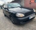 Черный Дэу Ланос, объемом двигателя 1.4 л и пробегом 200 тыс. км за 1299 $, фото 1 на Automoto.ua