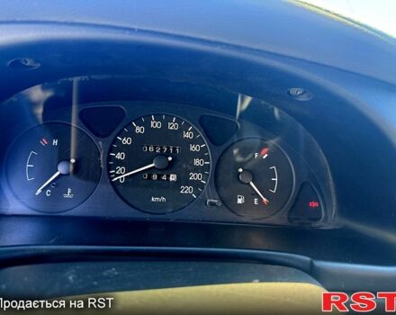Черный Дэу Ланос, объемом двигателя 15 л и пробегом 62 тыс. км за 3200 $, фото 4 на Automoto.ua