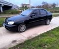 Черный Дэу Ланос, объемом двигателя 1.4 л и пробегом 152 тыс. км за 2500 $, фото 1 на Automoto.ua
