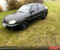 Чорний Деу Ланос, об'ємом двигуна 1.5 л та пробігом 256 тис. км за 1100 $, фото 1 на Automoto.ua