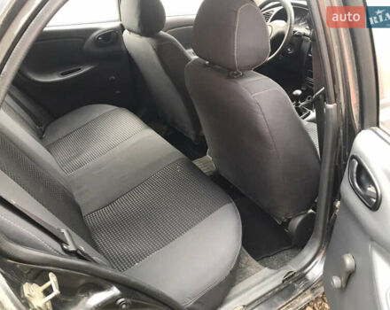 Черный Дэу Ланос, объемом двигателя 1.5 л и пробегом 150 тыс. км за 950 $, фото 5 на Automoto.ua
