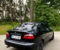 Черный Дэу Ланос, объемом двигателя 1.4 л и пробегом 245 тыс. км за 1700 $, фото 1 на Automoto.ua