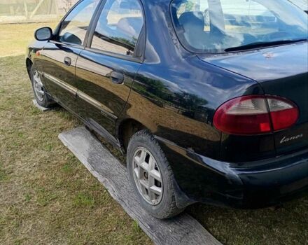 Черный Дэу Ланос, объемом двигателя 1.5 л и пробегом 171 тыс. км за 1600 $, фото 4 на Automoto.ua