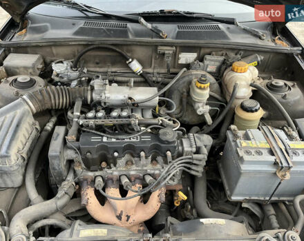 Черный Дэу Ланос, объемом двигателя 1.5 л и пробегом 219 тыс. км за 2300 $, фото 15 на Automoto.ua