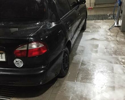 Чорний Деу Ланос, об'ємом двигуна 1.6 л та пробігом 333 тис. км за 1930 $, фото 3 на Automoto.ua