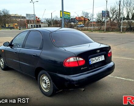 Черный Дэу Ланос, объемом двигателя 1.5 л и пробегом 98 тыс. км за 2700 $, фото 2 на Automoto.ua
