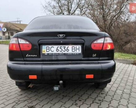 Черный Дэу Ланос, объемом двигателя 1.39 л и пробегом 213 тыс. км за 2300 $, фото 2 на Automoto.ua