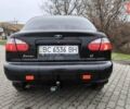 Черный Дэу Ланос, объемом двигателя 1.39 л и пробегом 213 тыс. км за 2300 $, фото 2 на Automoto.ua