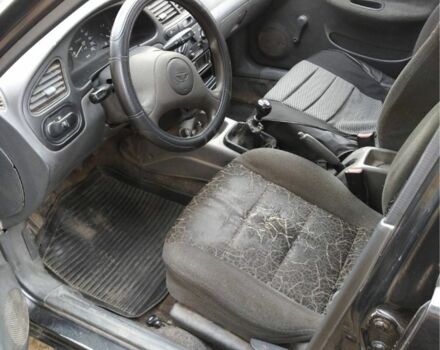 Черный Дэу Ланос, объемом двигателя 1.4 л и пробегом 1 тыс. км за 2000 $, фото 4 на Automoto.ua