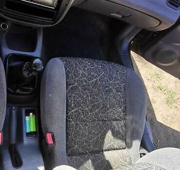 Черный Дэу Ланос, объемом двигателя 1.3 л и пробегом 160 тыс. км за 2000 $, фото 12 на Automoto.ua