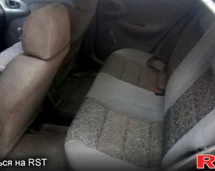 Черный Дэу Ланос, объемом двигателя 1.5 л и пробегом 276 тыс. км за 2000 $, фото 6 на Automoto.ua