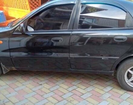 Черный Дэу Ланос, объемом двигателя 1.5 л и пробегом 156 тыс. км за 2000 $, фото 9 на Automoto.ua