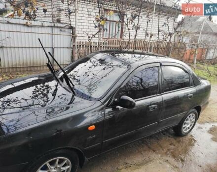 Черный Дэу Ланос, объемом двигателя 1.5 л и пробегом 130 тыс. км за 2700 $, фото 1 на Automoto.ua