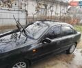 Черный Дэу Ланос, объемом двигателя 1.5 л и пробегом 130 тыс. км за 2700 $, фото 1 на Automoto.ua