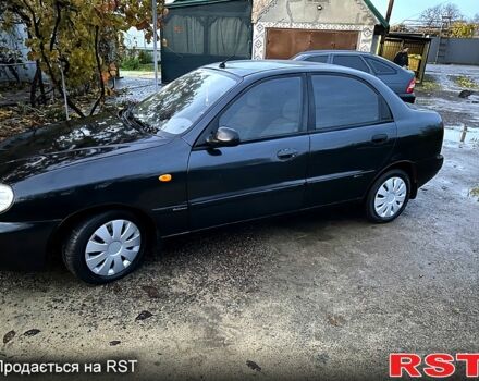 Черный Дэу Ланос, объемом двигателя 1.4 л и пробегом 220 тыс. км за 1800 $, фото 3 на Automoto.ua