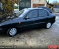 Черный Дэу Ланос, объемом двигателя 1.4 л и пробегом 220 тыс. км за 1800 $, фото 3 на Automoto.ua