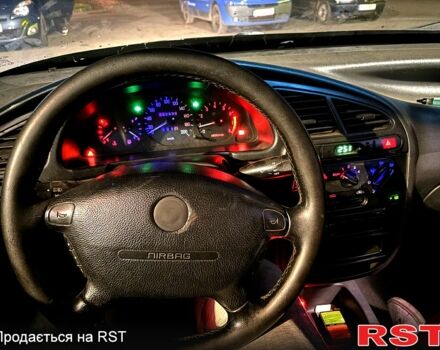 Черный Дэу Ланос, объемом двигателя 1.5 л и пробегом 292 тыс. км за 2300 $, фото 8 на Automoto.ua