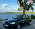 Черный Дэу Ланос, объемом двигателя 1.39 л и пробегом 160 тыс. км за 1499 $, фото 1 на Automoto.ua