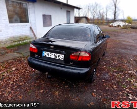 Чорний Деу Ланос, об'ємом двигуна 1.4 л та пробігом 150 тис. км за 1300 $, фото 3 на Automoto.ua