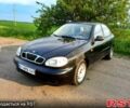 Черный Дэу Ланос, объемом двигателя 1.5 л и пробегом 368 тыс. км за 1150 $, фото 1 на Automoto.ua