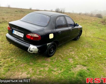 Чорний Деу Ланос, об'ємом двигуна 1.5 л та пробігом 256 тис. км за 1100 $, фото 5 на Automoto.ua