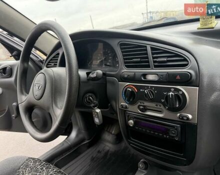 Черный Дэу Ланос, объемом двигателя 1.5 л и пробегом 128 тыс. км за 2999 $, фото 56 на Automoto.ua