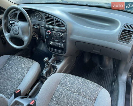 Черный Дэу Ланос, объемом двигателя 1.4 л и пробегом 233 тыс. км за 2500 $, фото 26 на Automoto.ua