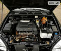 Черный Дэу Ланос, объемом двигателя 1.4 л и пробегом 132 тыс. км за 2950 $, фото 28 на Automoto.ua