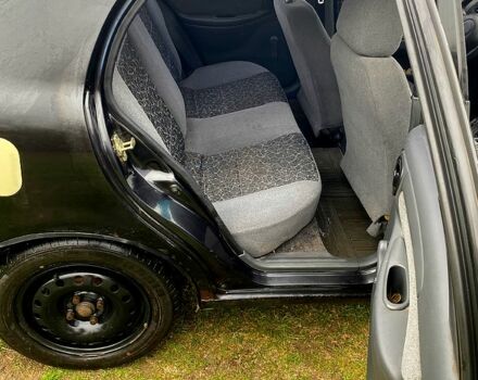 Чорний Деу Ланос, об'ємом двигуна 1.5 л та пробігом 256 тис. км за 1100 $, фото 7 на Automoto.ua