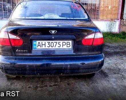 Черный Дэу Ланос, объемом двигателя 1.6 л и пробегом 269 тыс. км за 1300 $, фото 1 на Automoto.ua