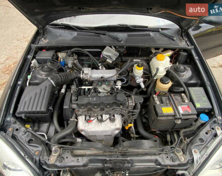 Черный Дэу Ланос, объемом двигателя 1.5 л и пробегом 231 тыс. км за 2900 $, фото 14 на Automoto.ua