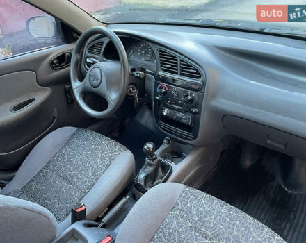 Черный Дэу Ланос, объемом двигателя 1.4 л и пробегом 233 тыс. км за 2500 $, фото 25 на Automoto.ua