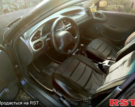 Черный Дэу Ланос, объемом двигателя 1.5 л и пробегом 0 тыс. км за 1950 $, фото 4 на Automoto.ua