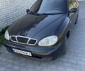 Черный Дэу Ланос, объемом двигателя 1.5 л и пробегом 246 тыс. км за 1400 $, фото 1 на Automoto.ua