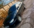 Чорний Деу Ланос, об'ємом двигуна 15 л та пробігом 211 тис. км за 3100 $, фото 1 на Automoto.ua